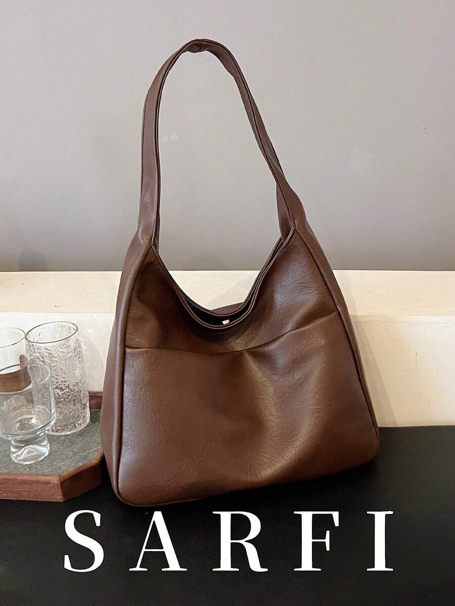 时尚新款秋冬咖啡色女士单肩包，经典百搭前袋设计手提包，现代简约纯色托特包，适合大学生日常购物和旅行，轻便大容量单肩包