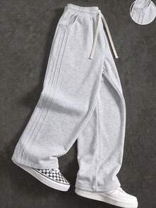 These Men's Casual Sports Pants Feature A Loose Straight-Leg Fit, Providing A Comfortable And Draped Feel. Suitable For Both Home And Outdoor Wear, They Also Make An Excellent Gift For Couples. The Pants Are Made From 100% Polyester Fabric. - Light Grey - View 1