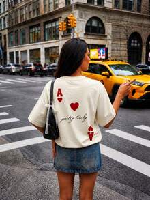 女款「Lucky Beauty」愛心撲克印花寬鬆露背短袖T恤，休閒街頭風下墜下擺，適合夏季日常穿著與派對 - 杏色 - 查看 6
