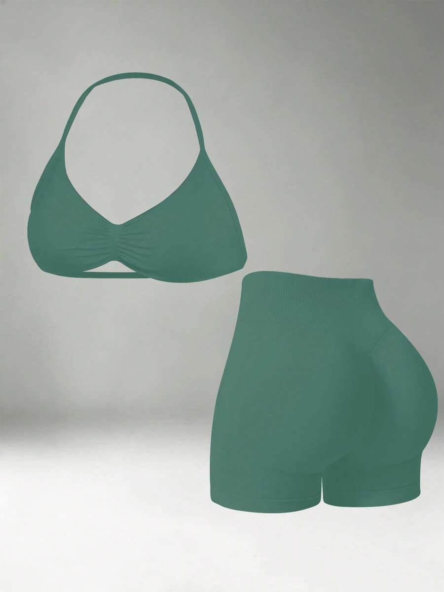 DINBEY Women's Seamless Yoga 2 Pieces Set, Halter Neck Sports Bra With Padding + High Waist Tummy Control Butt Lifting Ruched Fitness Shorts, Athleisure Outfit - Green - View 1