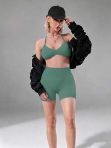 DINBEY Women's Seamless Yoga 2 Pieces Set, Halter Neck Sports Bra With Padding + High Waist Tummy Control Butt Lifting Ruched Fitness Shorts, Athleisure Outfit - Green - View 3