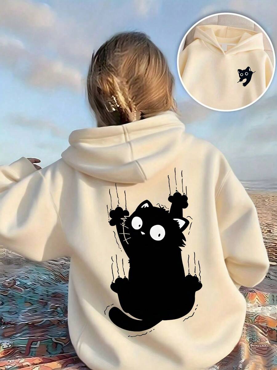 Sweatshirt abu-abu untuk anak perempuan dengan motif anak kucing hitam. Kombinasi motif yang lucu, cocok untuk olahraga santai, bepergian, dan pesta. - Aprikot - View 1