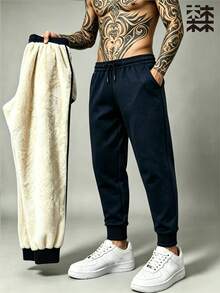 mulinsen Men's Solid Color Fleece Lined Drawstring Joggers, Warm Elastic Cuffed Pocket Sweatpants, Winter Casual Long Pants - Blue - View 1
