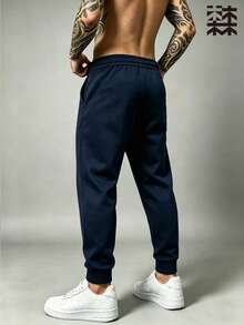 mulinsen Men's Solid Color Fleece Lined Drawstring Joggers, Warm Elastic Cuffed Pocket Sweatpants, Winter Casual Long Pants - Blue - View 5
