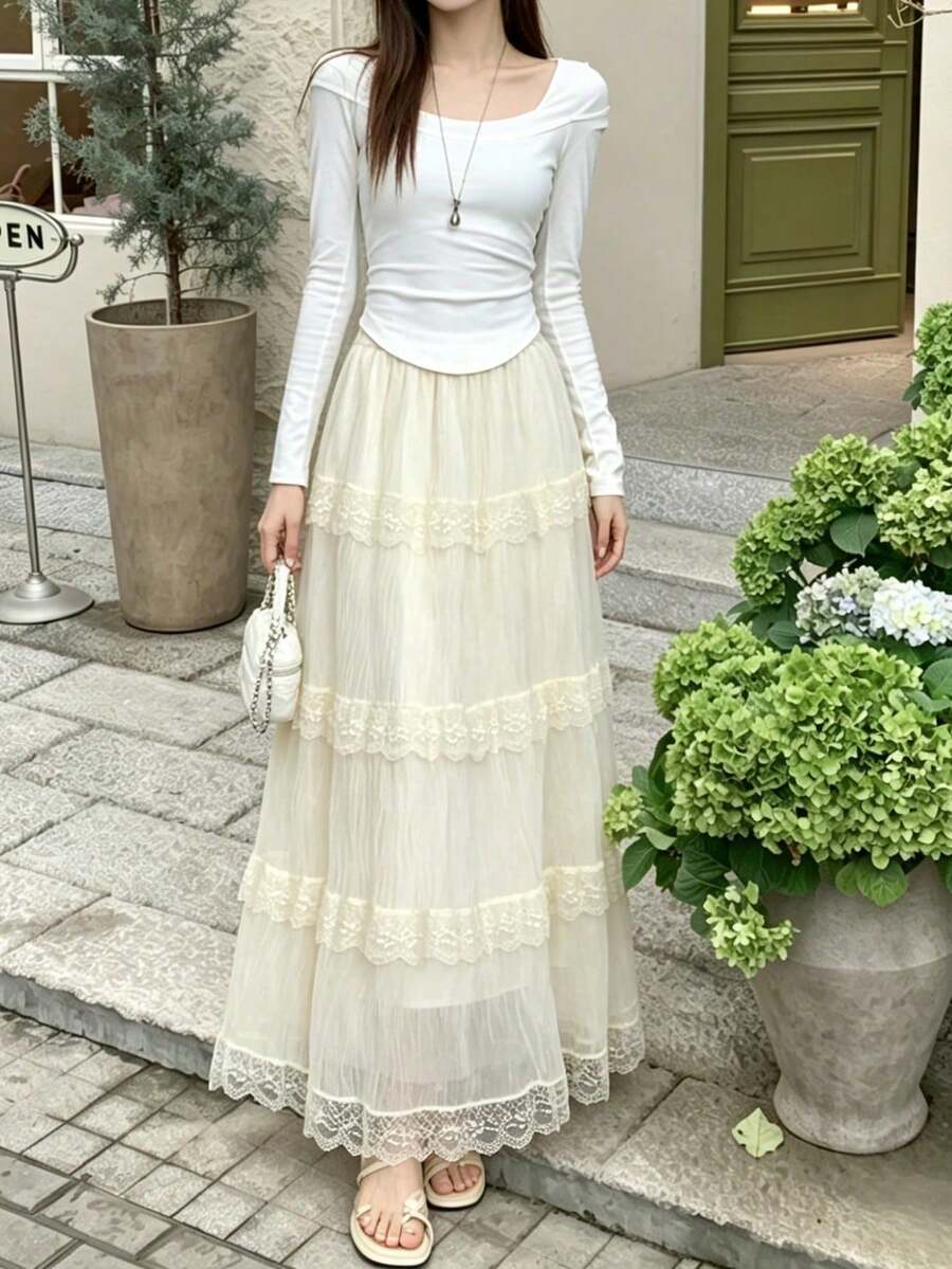 女款 2026 春夏高腰垂墜蕾絲飾邊網紗裙，喇叭蛋糕層次休閒裙，百搭顯瘦