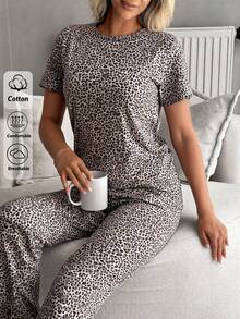 Där stil möter komfort Njut av din tid hemma med detta mjuka pyjamasset med kort ärm. - Vitt - Visa 4
