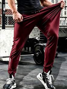 Men's Fashion Sports Long Pants, Dual Zipper Pockets, Drawstring Waist, Comfortable Fabric, Breathable, Suitable For Gym Training, Daily Wear, Outdoor Activities, Jogging, Travel - Red - View 1