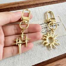 1pc Fashion Four-Pointed Star Hollow Sun Women's Keychain Pendant/Bag Charm - Multicolor - View 1