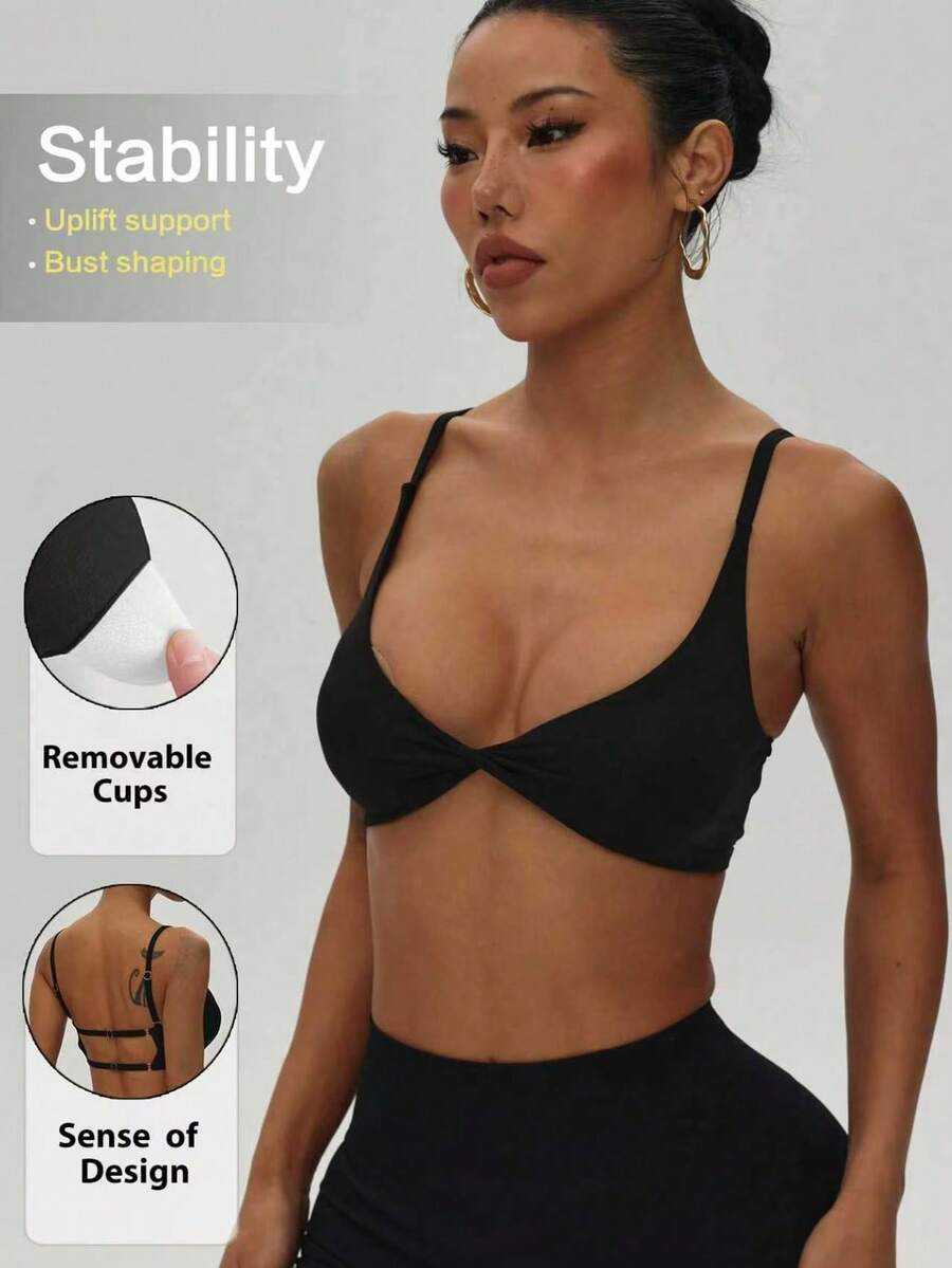 Women's Solid Color Removable Padded Twist Back Knit Sports Bra, Black - Black - View 1