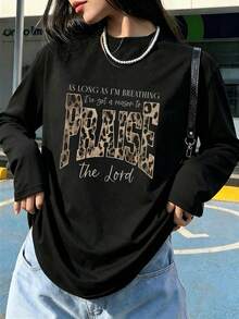 Plus Size Women's Leopard "Praise The Lord" Faith Letter Graphic Long Sleeve Tee, Moderate Stretch Crewneck Loose Christian Casual Fall Top - Black - View 4