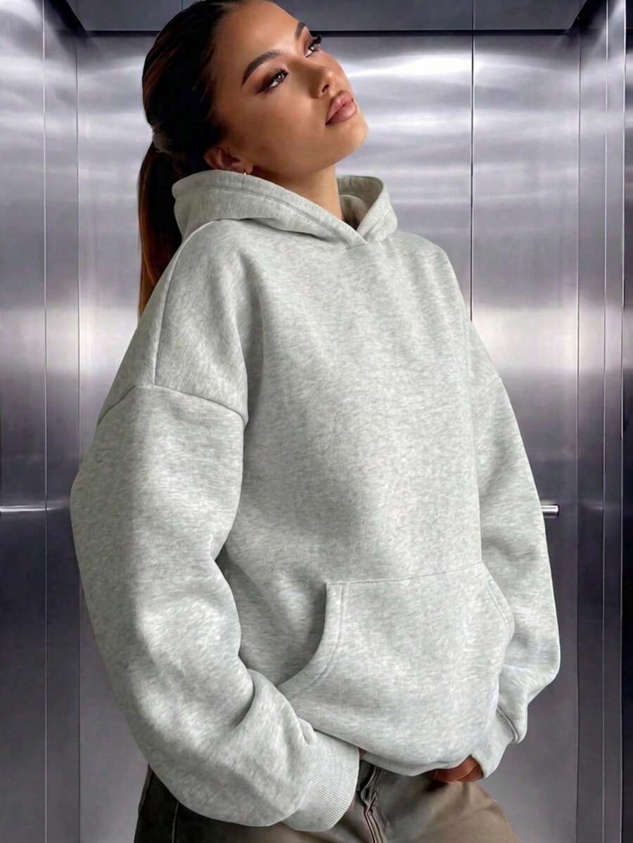 女款休閒抓絨連帽口袋寬鬆衛衣，適合秋冬日常穿著，秋冬服飾，秋冬穿搭，戶外穿搭