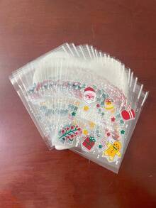 100pcs Transparent Santa Claus Bell Christmas Tree Pattern Gift Packaging OPP Bags, Christmas Theme Party Snowman Printed Small Gift Small Item Decoration Self-Sealing Bags, Can Be Used For Theme Event Promotion Gift Packaging Bags - J-Multicolor - View 5