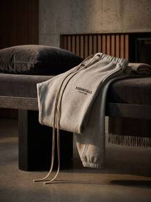 بنطال رياضي أساسي من الصوف الناعم من Fear Of God Essentials بلون رمادي فاتح، بنطال شارع فضفاض من الصوف الناعم للجنسين، ملابس كاجوال يومية متناسقة - رمادي فاتح مرقط - مشاهدة 9