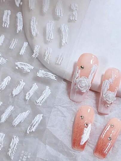 1pc/2pcs Autumn/Winter New White Brushstroke Texture Nail Stickers, Multiple Hand-Painted Brushstroke Patterns, Simulating Oil Painting Smear Texture, Creating Artistic Atmosphere. The Stickers Are Thin And Flexible, With High Texture Reproduction, Clean Cutting, Adhere Smoothly To Nail Surface Without Curling Edges, Easy To Peel And Stick