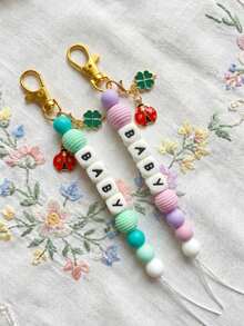 1pc Customized Name Threaded Silicone Keychain DIY English Letter Beaded Pendant, Seven-Star Ladybug Bag Charm, Lucky Four-Leaf Clover Decoration, Personalized Custom Letter Key Hanger, DIY Exclusive Name Pendant, Best Friend Couple Birthday Gift - Ladybug Thread - View 7