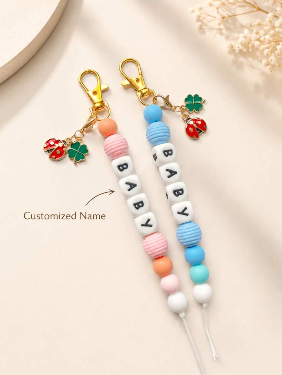 1pc Customized Name Threaded Silicone Keychain DIY English Letter Beaded Pendant, Seven-Star Ladybug Bag Charm, Lucky Four-Leaf Clover Decoration, Personalized Custom Letter Key Hanger, DIY Exclusive Name Pendant, Best Friend Couple Birthday Gift - Ladybug Thread - View 1