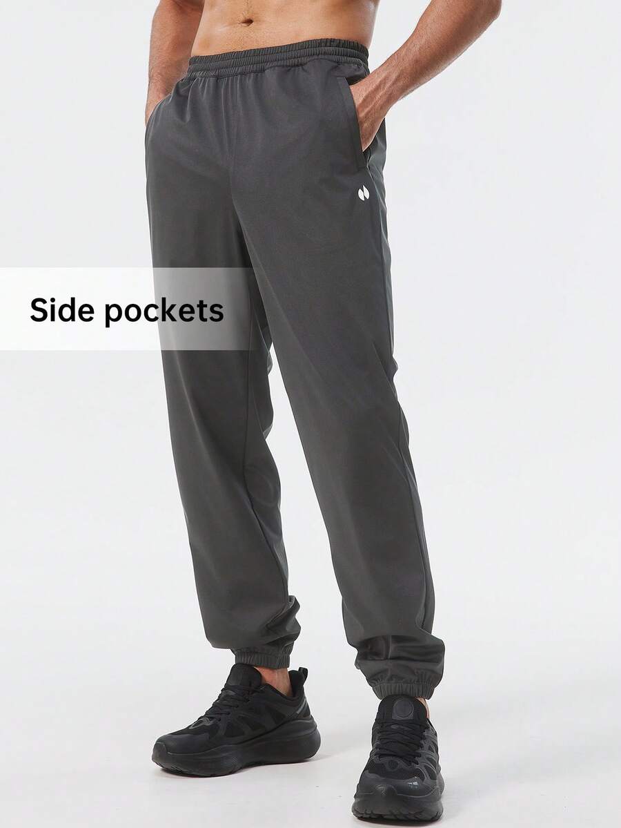 HOTSUIT Men's Solid Color Spring Sport Pants Sweat Pants With Drawstring, Designed For Running Training Workout Gym Exercise, Valentine Gift - Dark Grey - View 1