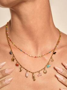 Altistry 1 قطعة قلادة متعددة الطبقات ملونة مطلية بالذهب عيار 18 قيراط من الفولاذ المقاوم للصدأ، بتصميم حصان البحر، ونجم البحر، والقلب، ودلاية الشمس - متعدد الألوان - مشاهدة 1