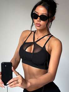 Women's Solid Color Removable Padded Criss-Cross Strap Mesh Patchwork Knit Sports Bra - Black - View 3