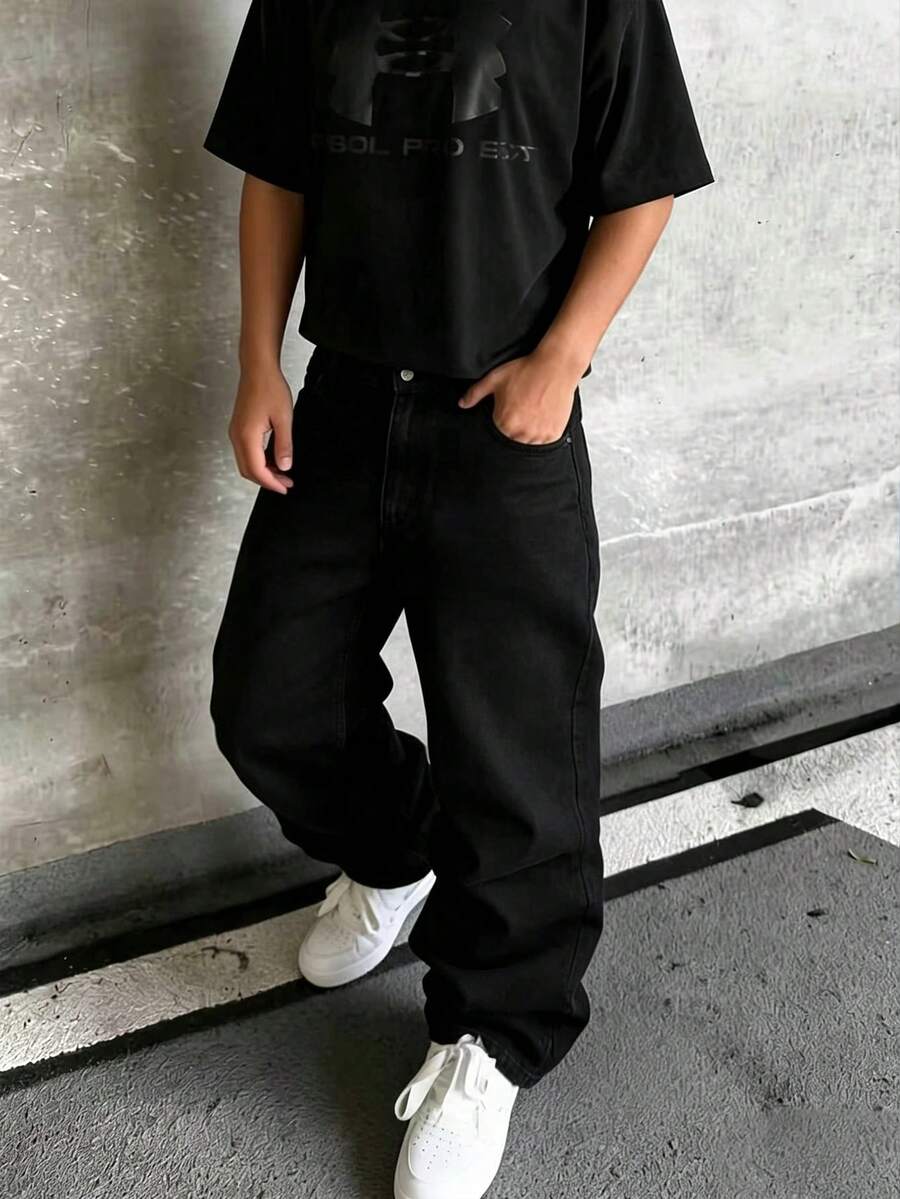 Herrjeans i denim med knappar och fickor, enfärgade - Svart - Visa 1