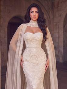فستان سهرة فاخر مرصع بالراين بأسلوب حورية البحر، بياقة على شكل قلب، مع أكمام كاب من التول - لون شمبانيي - مشاهدة 3