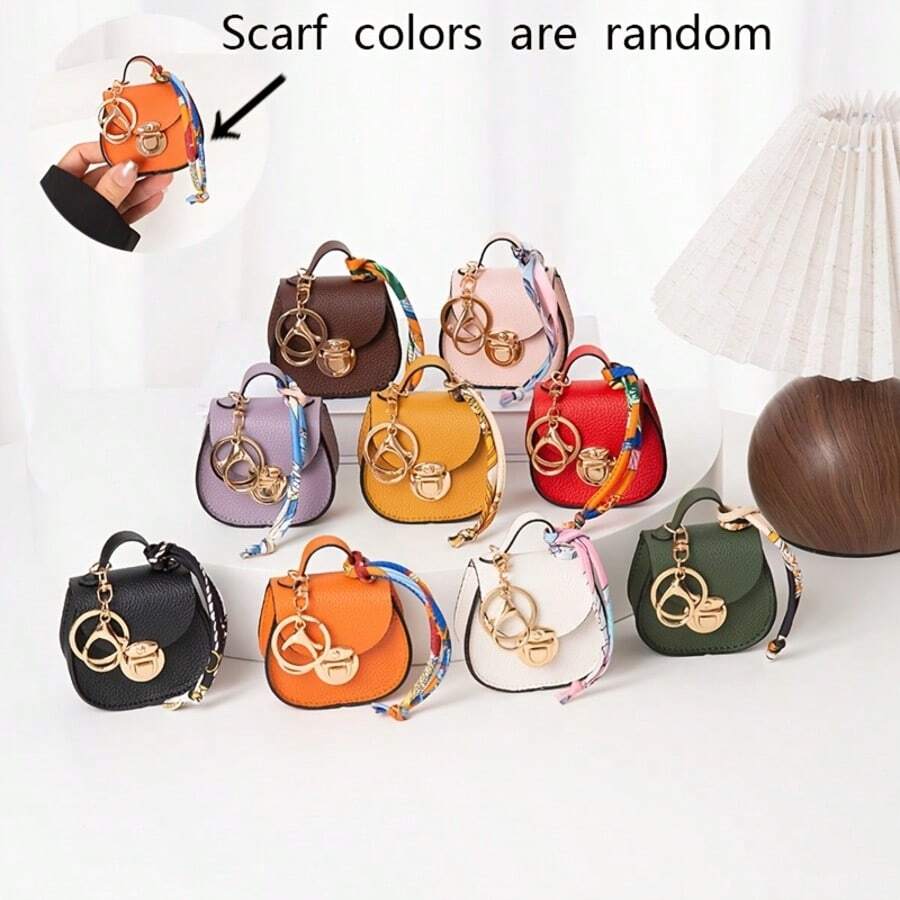 This Coin Purse Is Crafted From Carefully Selected Litchi-Textured PU Leather And Features A Classic Mini Saddle Design, Complete With A Flap And Metal Clasp. The Edges Are Reinforced With Fine Black Oil-Edging. - Multicolor - View 1