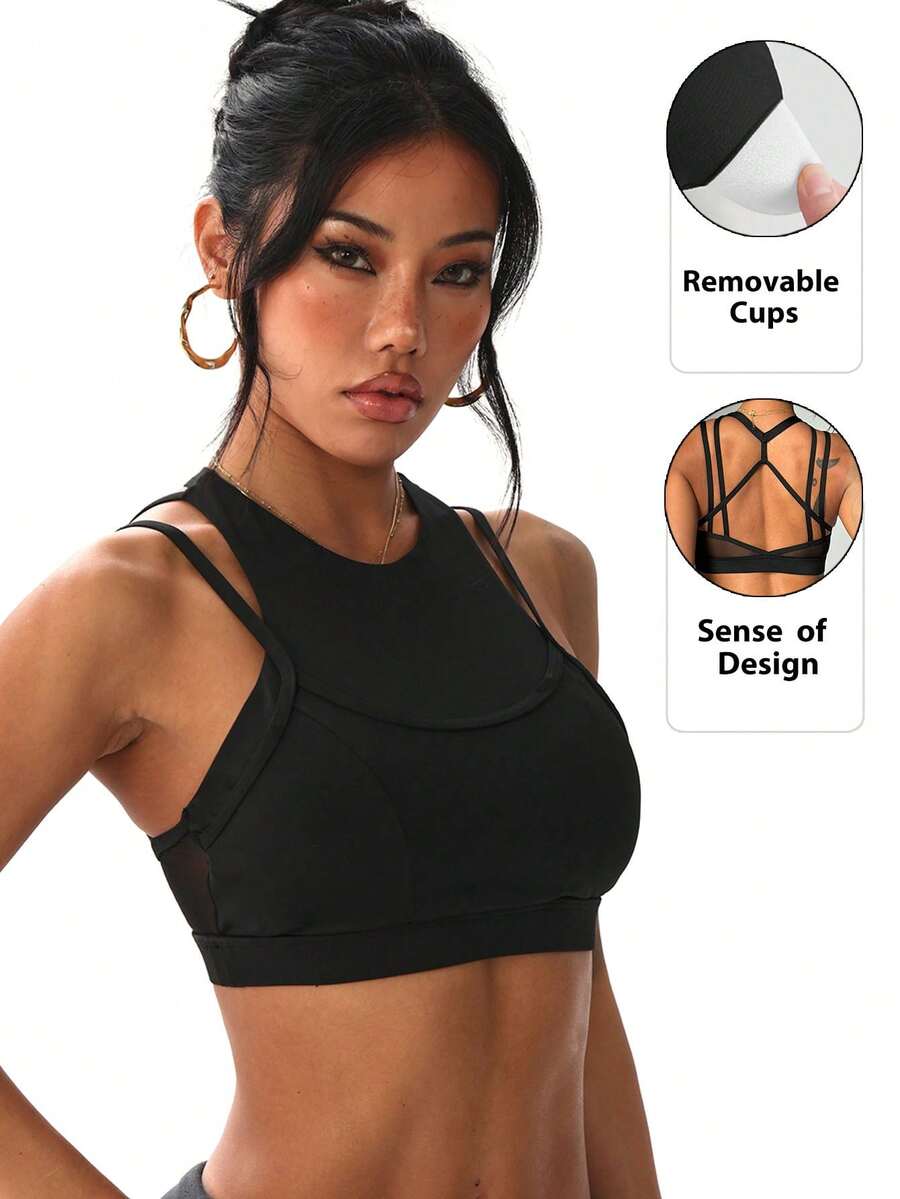 Women's Solid Color Removable Padded Crew Neck Mesh Patchwork Criss-Cross Sports Knit Bra - Black - View 1