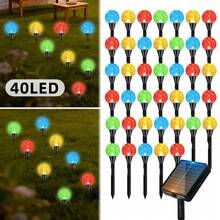 Dream Garden 太陽能泡泡球路燈，提供 20LED 與 40LED 選項，太陽能板白天自動充電，夜晚自動亮燈，透明泡泡水晶球燈罩含碎鑽粒子，光線折射出細膩閃爍光點，暖黃色光營造溫馨氛圍，地插式底座方便安裝，可直接插入草坪或土壤，無需接線或外部電源，擺放靈活不受電纜限制 - 太陽能氣泡球引路燈 - 查看 13