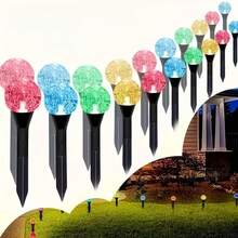Dream Garden 太陽能泡泡球路燈，提供 20LED 與 40LED 選項，太陽能板白天自動充電，夜晚自動亮燈，透明泡泡水晶球燈罩含碎鑽粒子，光線折射出細膩閃爍光點，暖黃色光營造溫馨氛圍，地插式底座方便安裝，可直接插入草坪或土壤，無需接線或外部電源，擺放靈活不受電纜限制 - 太陽能氣泡球引路燈 - 查看 10