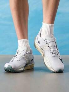 Sepatu Lari Low-Top Nike Rival Fly 4 yang Nyaman, Bernapas, dan Memantul untuk Pria, Abu-abu - Grey - View 1