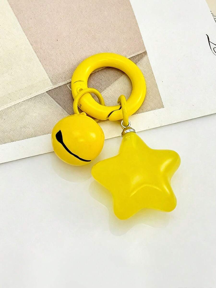 Móc khóa treo túi hình ngôi sao 5 cánh màu vàng kẹo dẻo dễ thương kèm chuông nhỏ, mặt treo móc khóa cho bé gái - A - Xem 1