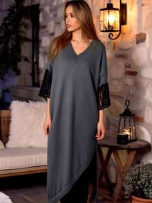 Elegant And Mature Plus-Size Pullover Sweater For Autumn And Winter, Perfect For Everyday Commuting And Outings. Features A Retro V-Neck, Color-Blocked Design, Fashionable Openwork Sleeves, And An Asymmetrical Hem. Mid-Length Style. - Black - View 2