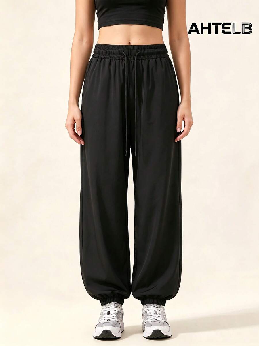 AHTELB Women Loose Harem Pants, Elastic Waist Joggers For Sports Workout Daily Wear, Practical Gift For Best Friend, Girlfriend, Family - Black - View 1