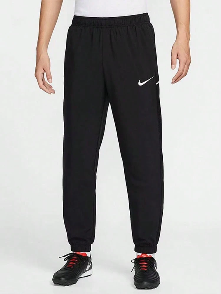 Nike Dri-FIT Men's Quick-Dry Tapered Knit Training Pants - Black - View 1