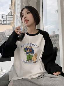 女款純棉寬鬆休閒百搭印花插肩袖對比色卡通角色與小狗長袖T恤 - 黑與白 - 查看 4