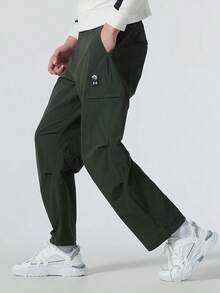 Under Armour Men's Loose Straight-Leg Cargo Joggers, Durable Stretch Multi-Pocket Pants For Hiking, Travel, And Casual Daily Wear - Black - View 4