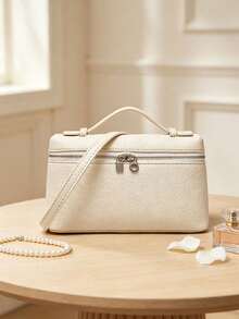 Handbag With A Clean, Structured Silhouette, Zipper Closure And Exquisite Lock Detail. Comes With A Short Handle And A Detachable Long Shoulder Strap, Supporting Multiple Carrying Styles. The Interior Space Is Well-Organized For Storing Personal Items, Making It A Versatile And Timeless Accessory For Daily Outings And Easy To Match With Various Outfits. - Ivory - View 4