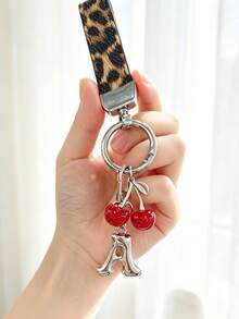 26 Alphabet Car Keychains, Silver Letter Zinc Alloy Accessories, Leopard Print Cherry Pendant, PU Rope Car Lock Key Fob, Car Remote Control Hanging Decoration, Bag Decoration Pendant, Car Key Ring, Key Chain Key Accessories. Holiday Gift, - Letter - View 10