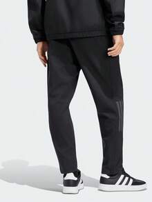 Adidas Pantalones tejidos SL WARM PNT para hombre KW3372 - Negro - Ver 3