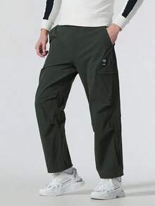 Under Armour Men's Loose Straight-Leg Cargo Joggers, Durable Stretch Multi-Pocket Pants For Hiking, Travel, And Casual Daily Wear - Black - View 3