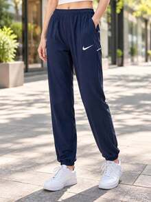Nike Men's Long Pants Woven Casual Pants Daily Outdoor Comfortable Waist Drawstring Sports Pants IB8910-41 - Midnight Navy - View 1