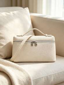 Handbag With A Clean, Structured Silhouette, Zipper Closure And Exquisite Lock Detail. Comes With A Short Handle And A Detachable Long Shoulder Strap, Supporting Multiple Carrying Styles. The Interior Space Is Well-Organized For Storing Personal Items, Making It A Versatile And Timeless Accessory For Daily Outings And Easy To Match With Various Outfits. - Ivory - View 3