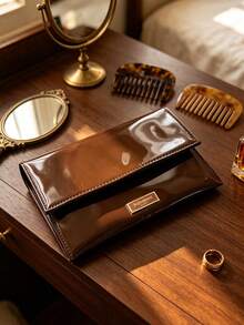 Yves Saint Laurent YSL Dark Brown Patent Leather Cosmetic Bag, Snap Button Flap Makeup Pouch With Metal Logo Plate, Multi‑Functional Beauty Storage Pouch, Ideal For Personal Use Or As A Beauty Gift - Rust Brown - View 1