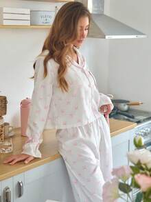 Women's Short Notch Neck Pajama Set, Pink Bow Print Wavy Stripe Long Sleeve Tie Cuff Top With Ruffle Wide Leg Pants, Soft Loungewear - Pink - View 1