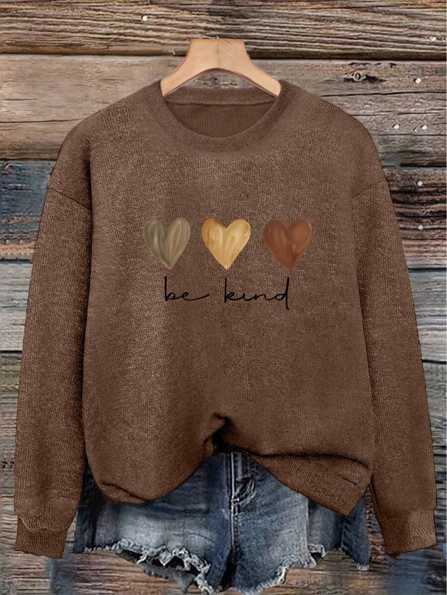 Plus-Size Women's Top Featuring A Three-Color Heart Pattern And The Slogan "Be Kind To Others"; Soft, Comfortable, Stylish, And Elegant. - Dark Ochre - View 1