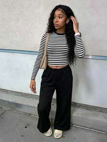 LovelyWholesale Women's Casual Round Neck Long Sleeve Striped Print Top With Drawstring Straight Leg Pants 2 Pieces Set Autumn Outfit - Black - View 1