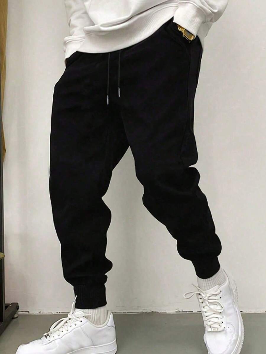 Men's Casual Lightweight Sports Pants, Slightly Loose Tapered Leg, Suitable For Home And Outdoor Activities. Made Of 100% Polyester, With Drawstring Waist For Easy Adjustment - Black - View 1