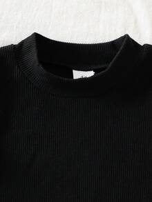 Bộ 3 món cho bé gái phong cách trẻ trung dễ thương, gồm áo gile cổ lông teddy in hình trái tim, áo giữ nhiệt gân và quần ống loe, trang phục thường ngày ấm áp cho mùa thu/đông - màu đen - Xem 7