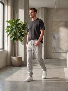 بنطال جوجر من الصوف الناعم بلون الشوفان الفاتح من Fear Of God ESSENTIALS SS22، بقصة فضفاضة مع رباط خصر وأساور مطاطية، بنطال ستريت وير للخروجات اليومية - لون الشوفان الفاتح - مشاهدة 10