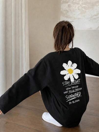 2026 秋新作 韓国風 秋服 t シャツ 長袖 秋服レディース ロン t 長袖 デイジー花プリント ブラック カジュアル 日常使い バックプリントトップス